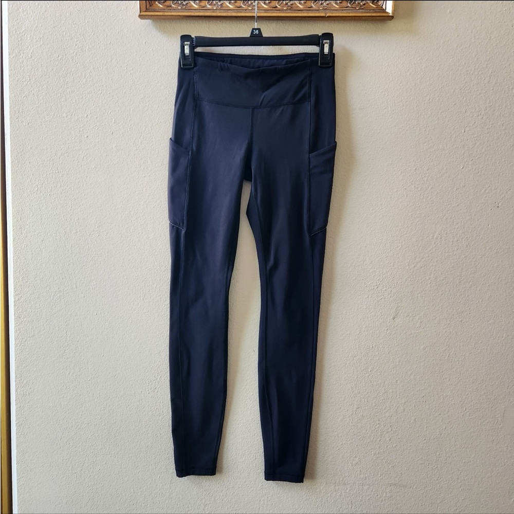 Lululemon black leggings with side pockets size 4